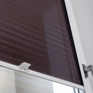 Roller blinds with reflective film